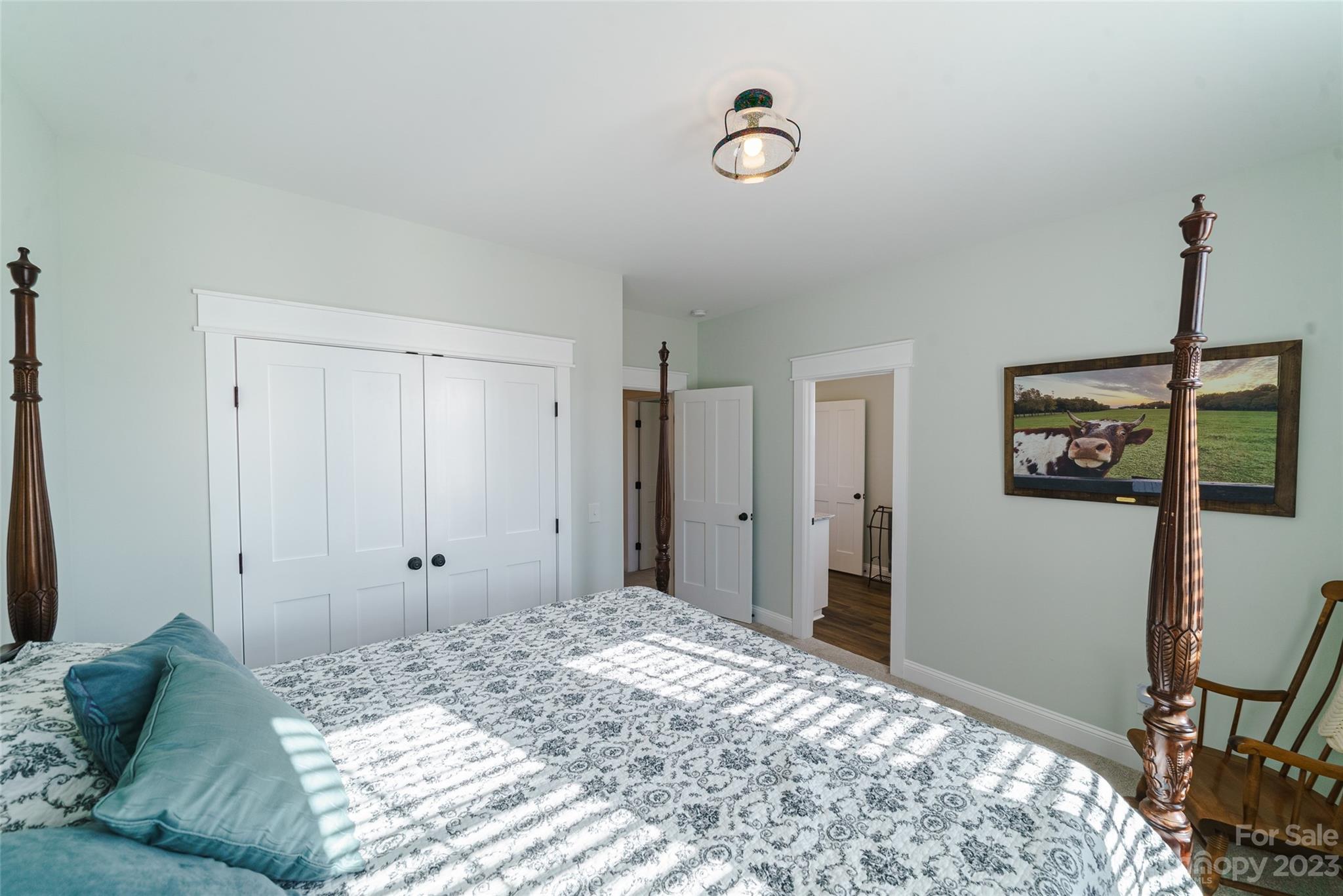 16063 McLester Road Oakboro, NC 28129 - Photo 28 of 48 a bedroom with a bed and a dresser