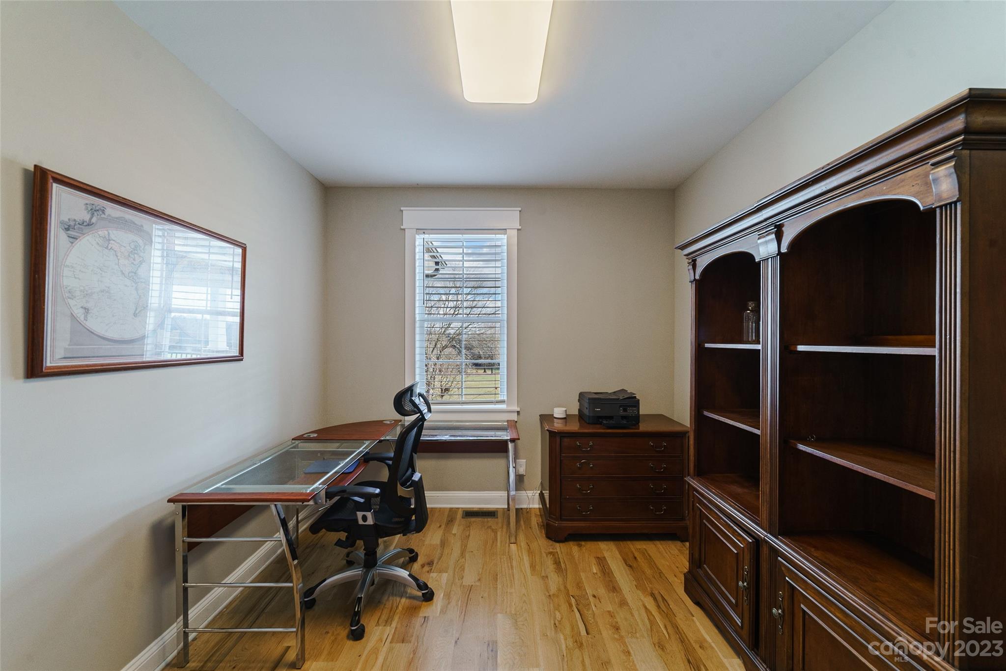 16063 McLester Road Oakboro, NC 28129 - Photo 29 of 48 a view of a workspace with furniture and a window