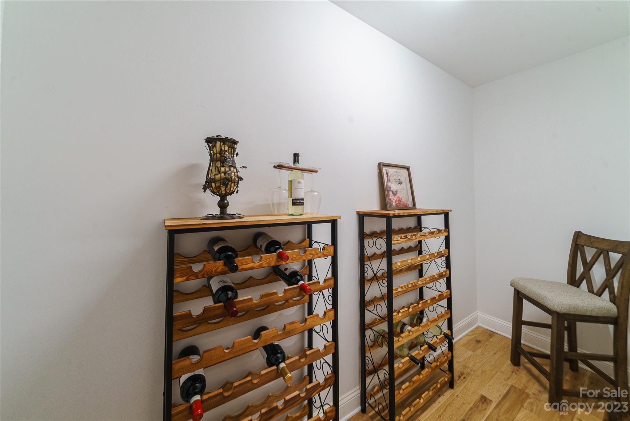 16063 McLester Road Oakboro, NC 28129 - Photo 33 of 48 a room that has a table and a chair