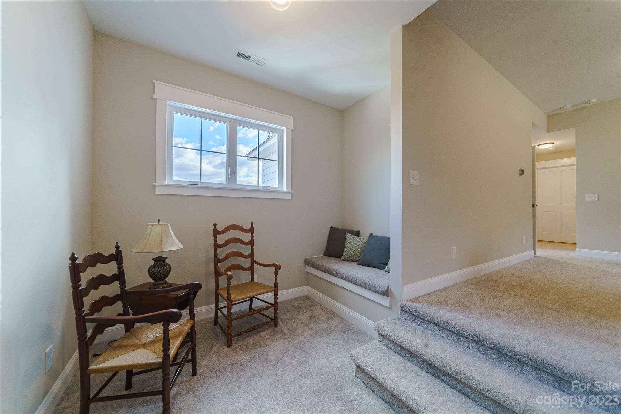 16063 McLester Road Oakboro, NC 28129 - Photo 34 of 48 a living room with furniture and a window