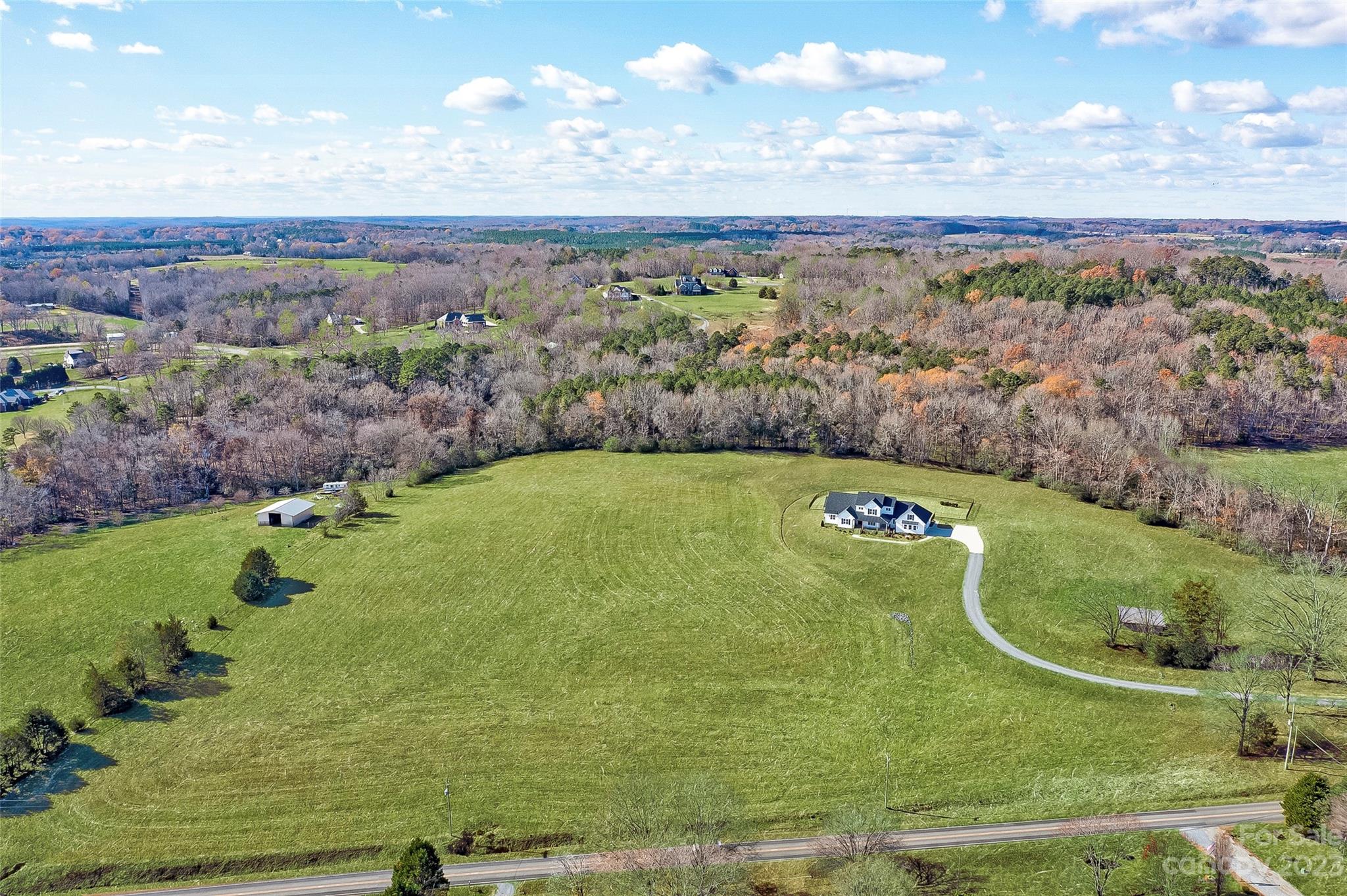 16063 McLester Road Oakboro, NC 28129 - Photo 45 of 48 a view of a swimming pool with a yard