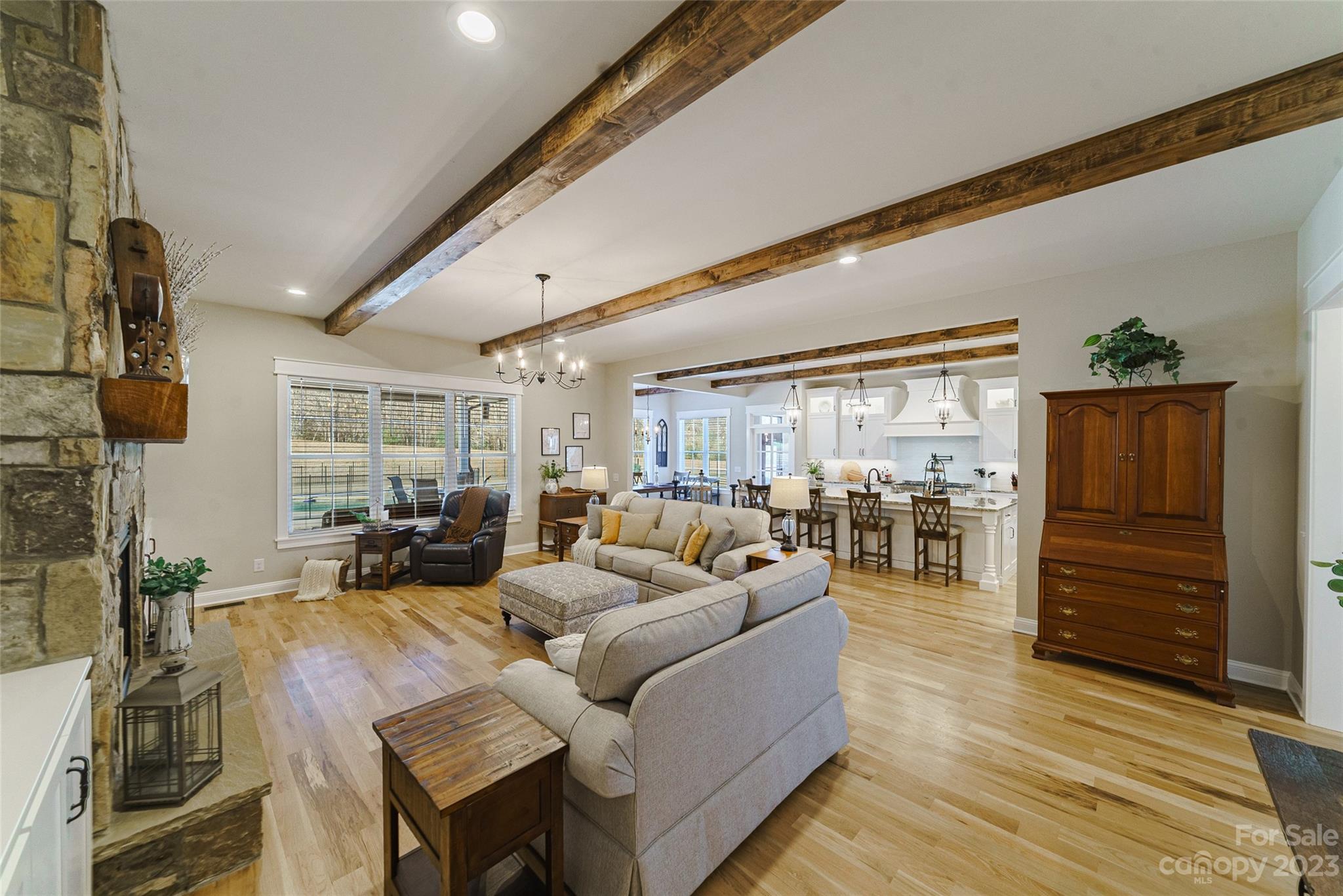 16063 McLester Road Oakboro, NC 28129 - Photo 10 of 48 a living room with furniture and wooden floor