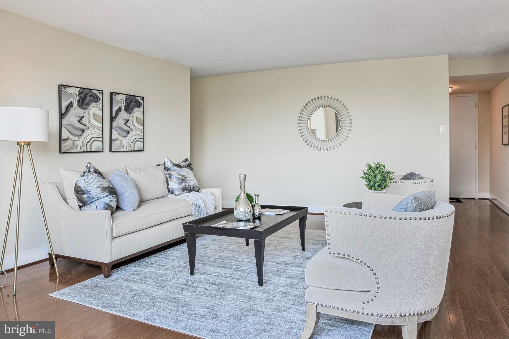 1220 Blair Mill Road, Unit 605 Silver Spring, MD 20910 - Photo 11 of 46 a living room with furniture