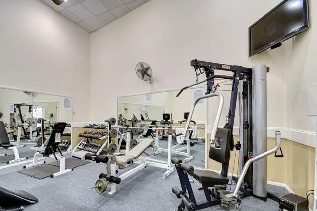 a view of a room with gym equipment