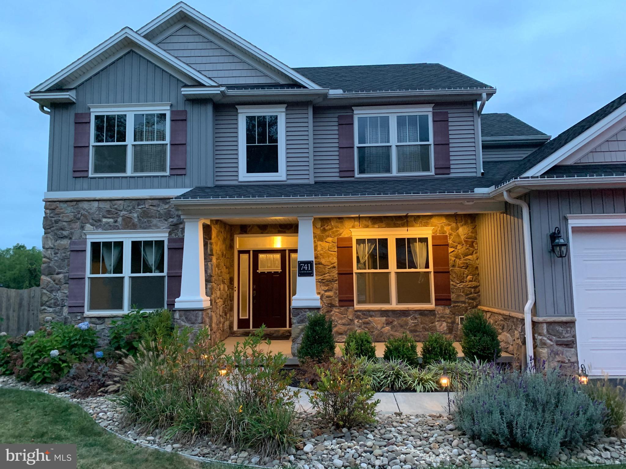 741 South River Road Halifax, PA 17032 - Photo 114 of 117 a front view of a house with glass windows and plants
