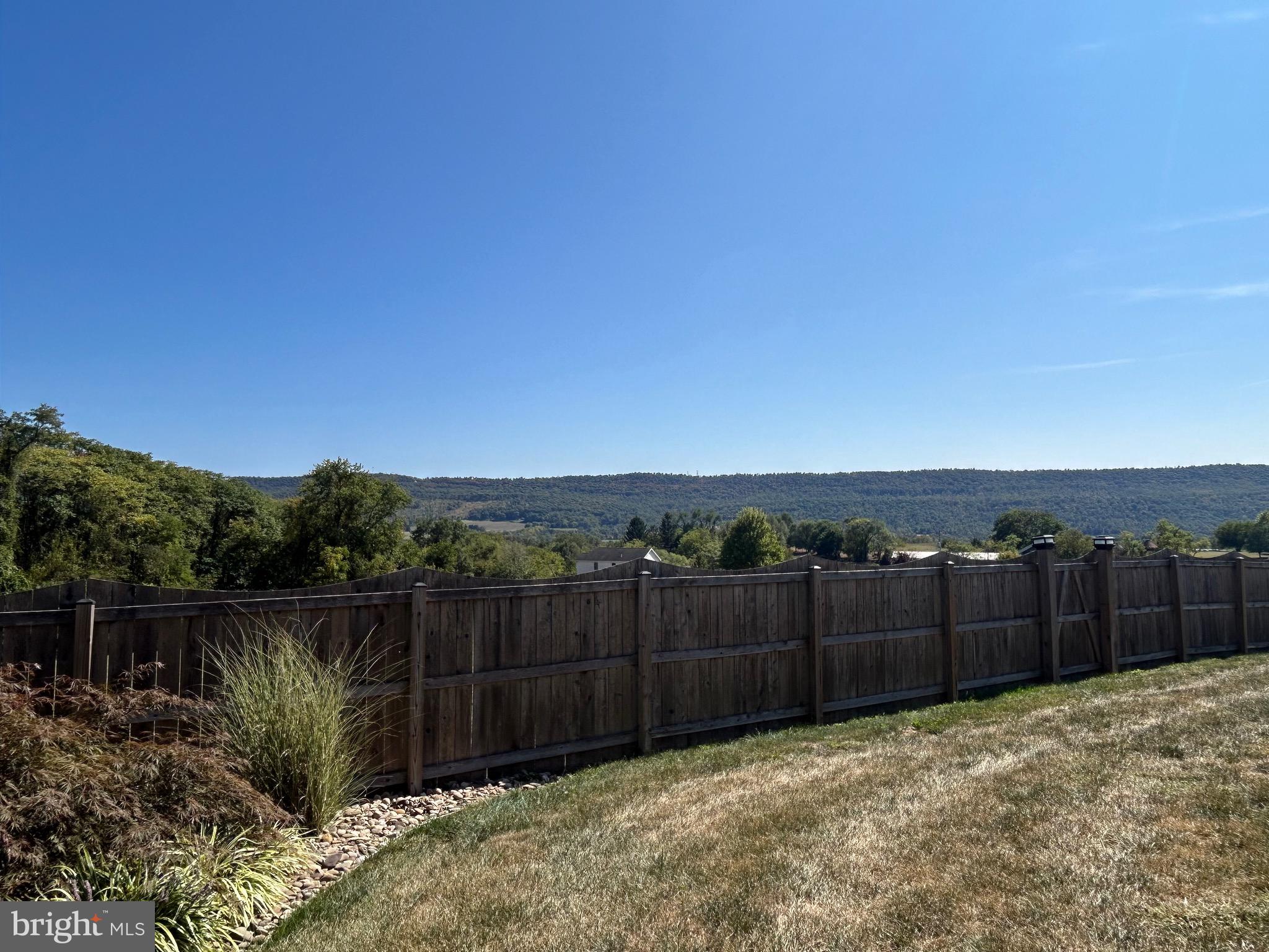 741 South River Road Halifax, PA 17032 - Photo 23 of 117 a view of a backyard with wooden fence