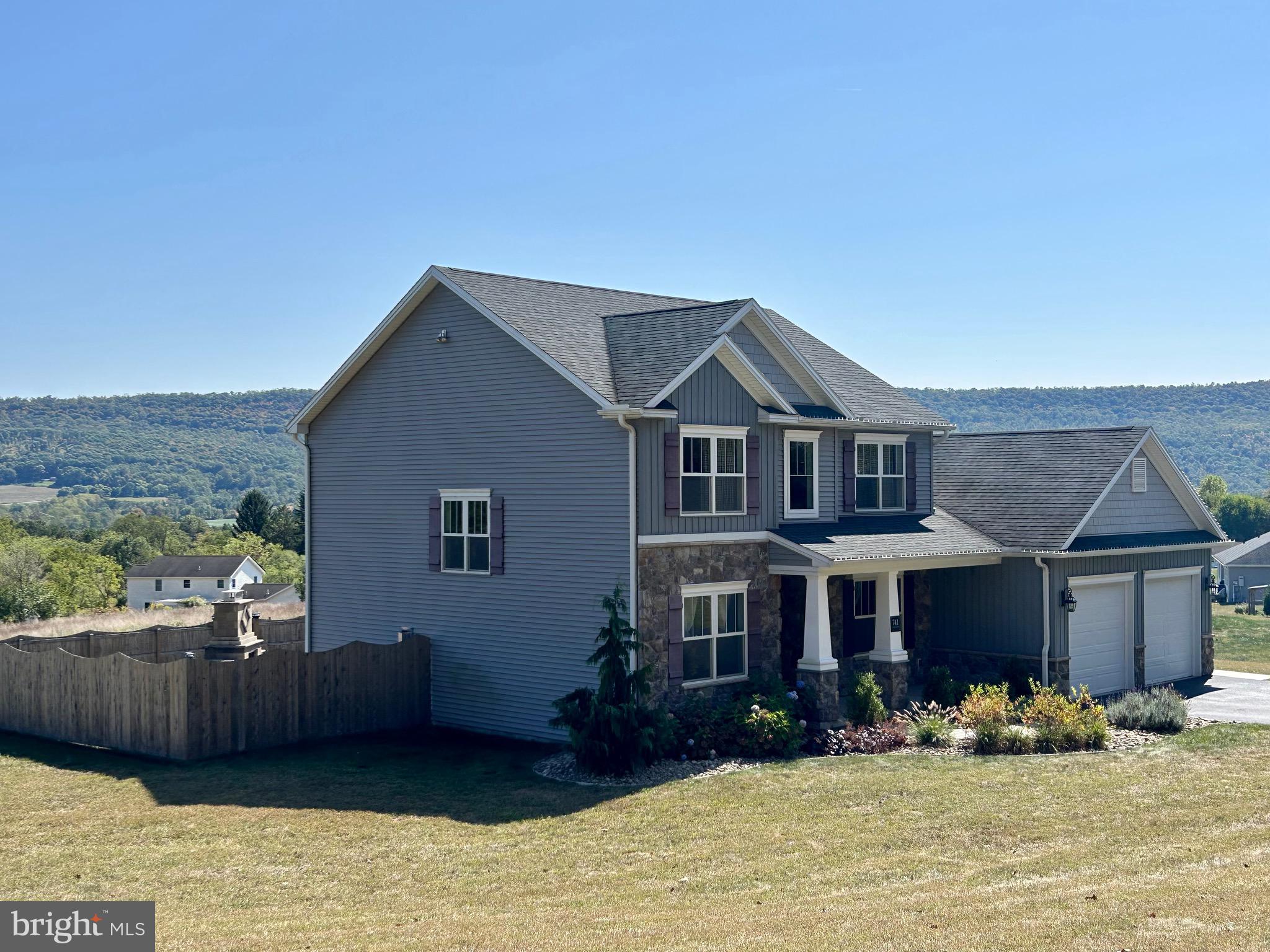 741 South River Road Halifax, PA 17032 - Photo 4 of 117 a front view of a house with a yard outdoor seating and kitchen view