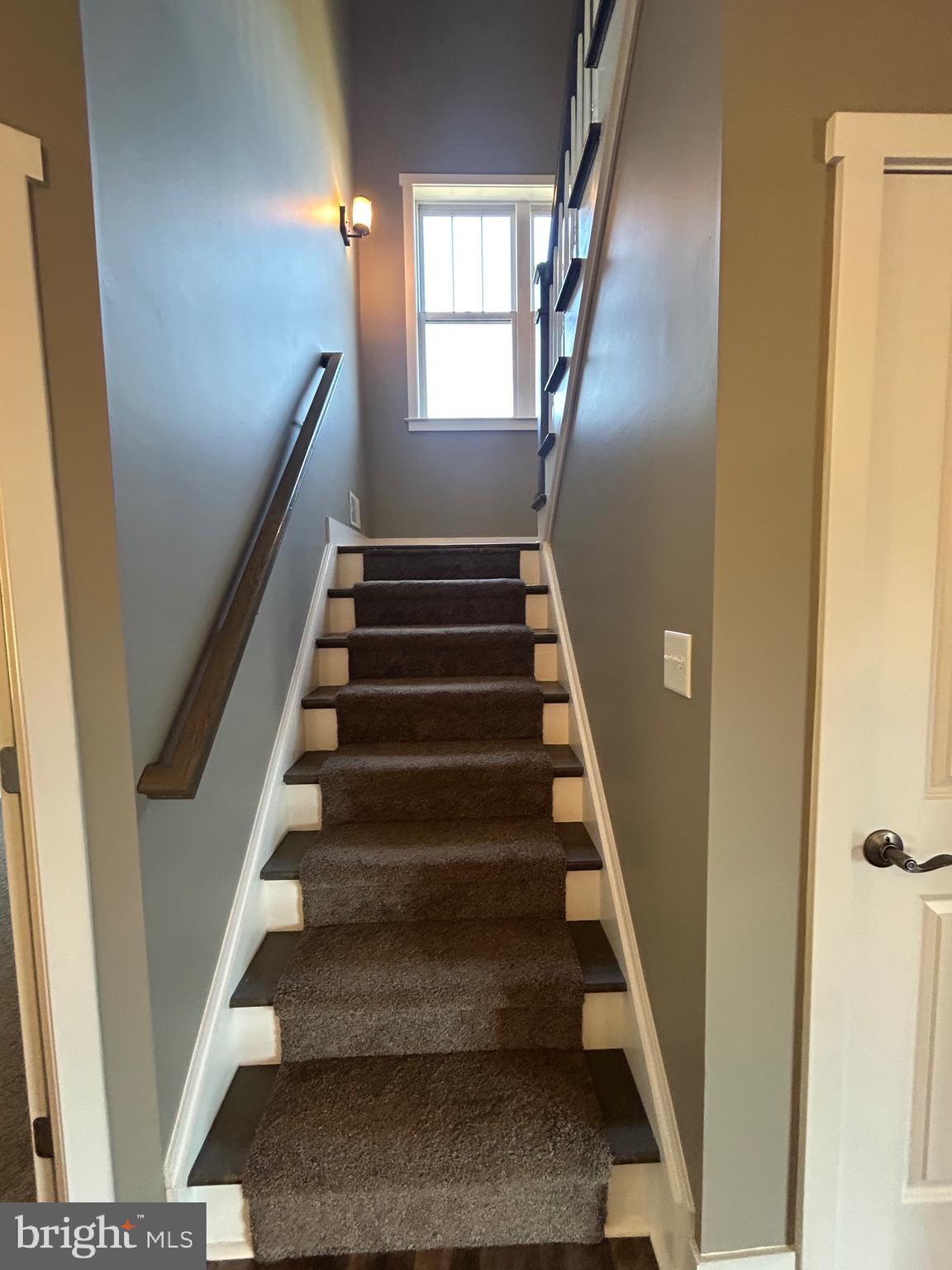741 South River Road Halifax, PA 17032 - Photo 62 of 117 a view of staircase with lots of frames on wall and a window