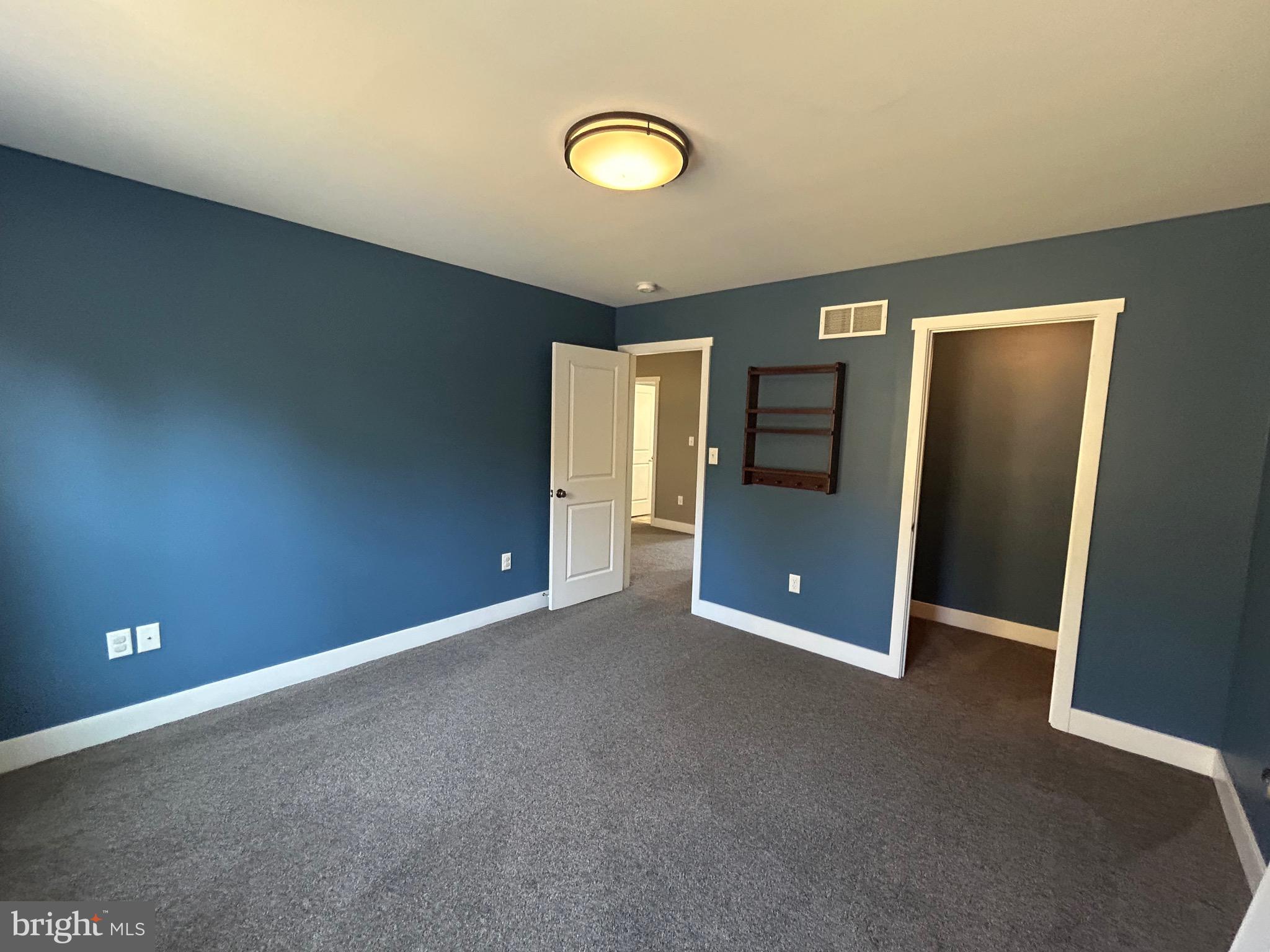 741 South River Road Halifax, PA 17032 - Photo 71 of 117 a view of an empty room with wooden floor and cabinet