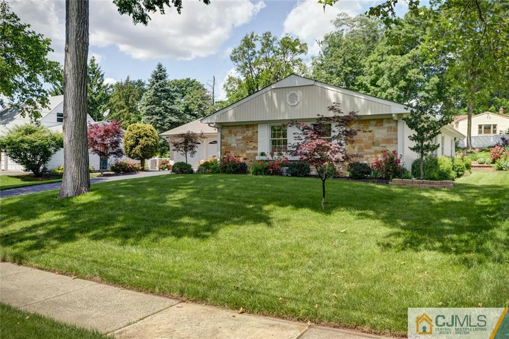 25 Indiana Road Somerset, NJ 08873 - Photo 2 of 25 a front view of a house with a garden