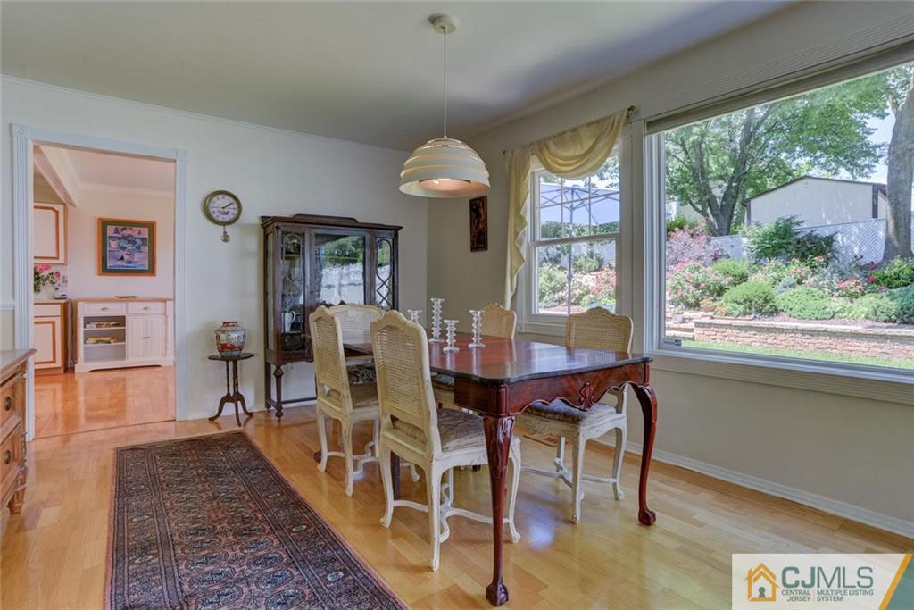25 Indiana Road Somerset, NJ 08873 - Photo 11 of 25 a view of a dining room with furniture window and wooden floor