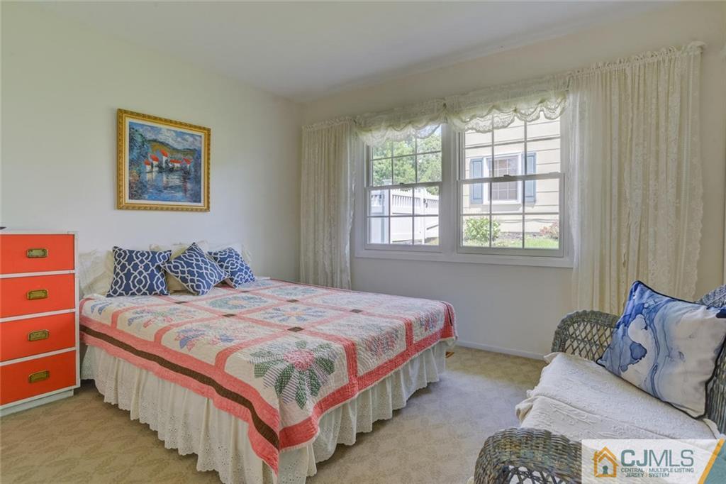 25 Indiana Road Somerset, NJ 08873 - Photo 18 of 25 a bedroom with a bed and a couch