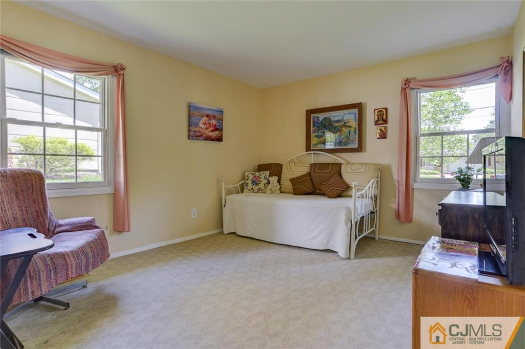 25 Indiana Road Somerset, NJ 08873 - Photo 19 of 25 a living room with furniture and a window