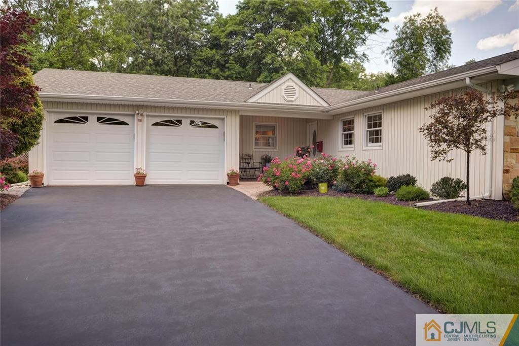 25 Indiana Road Somerset, NJ 08873 - Photo 3 of 25 a front view of a house with garden