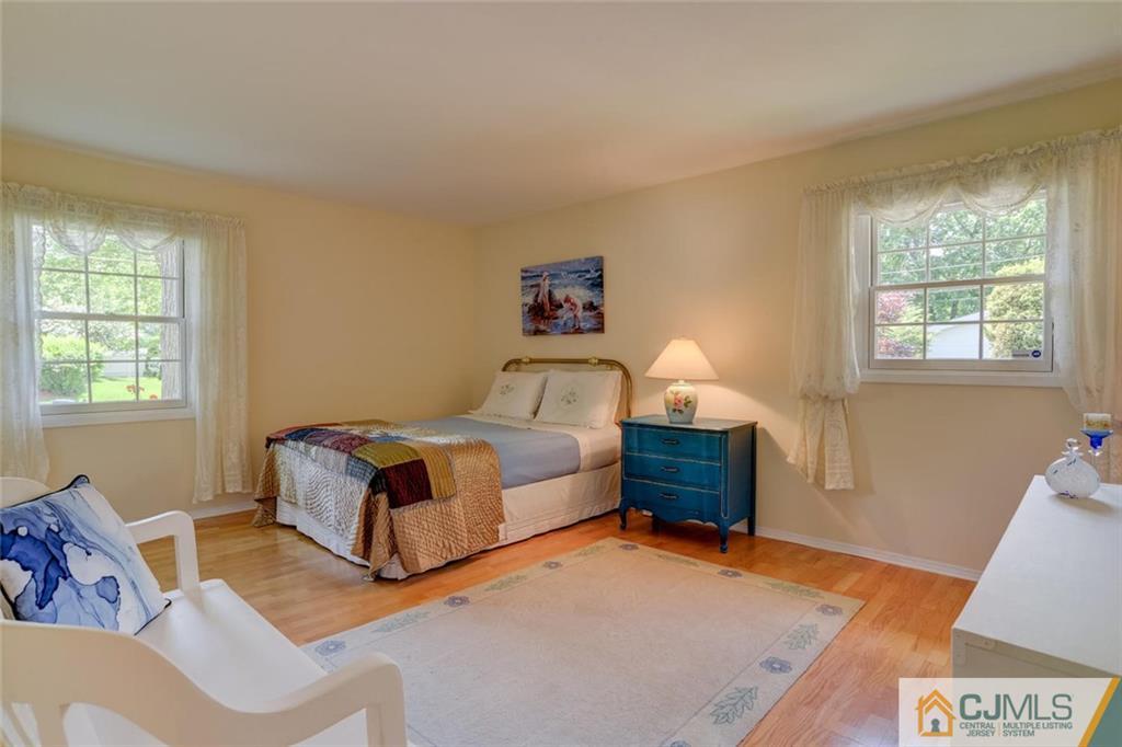 25 Indiana Road Somerset, NJ 08873 - Photo 21 of 25 a spacious bedroom with a bed and window