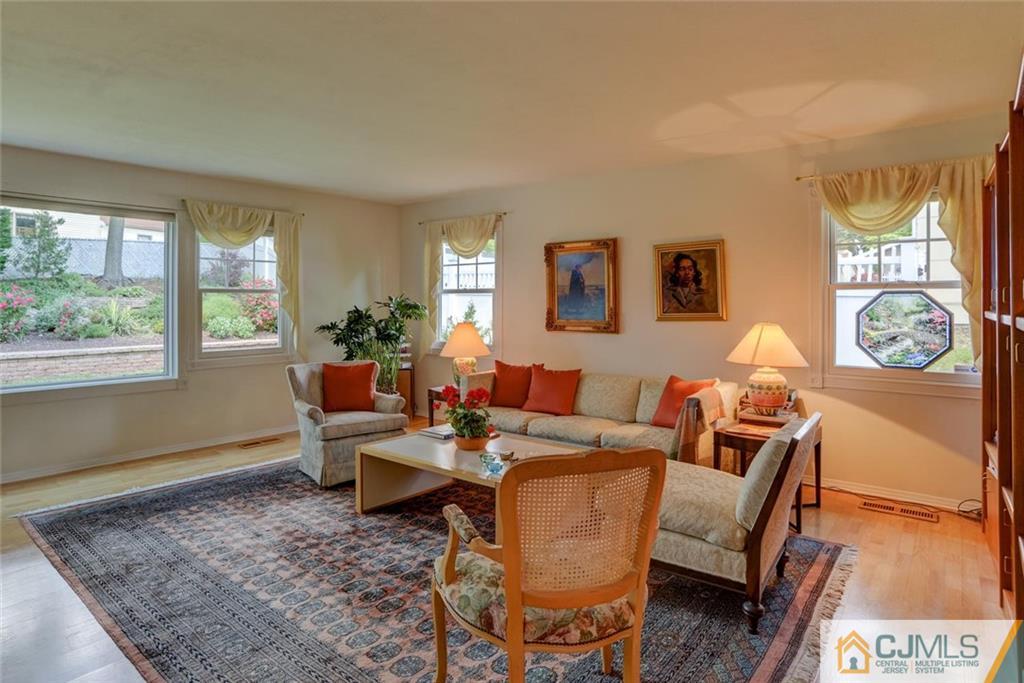 25 Indiana Road Somerset, NJ 08873 - Photo 8 of 25 a living room with furniture and a window