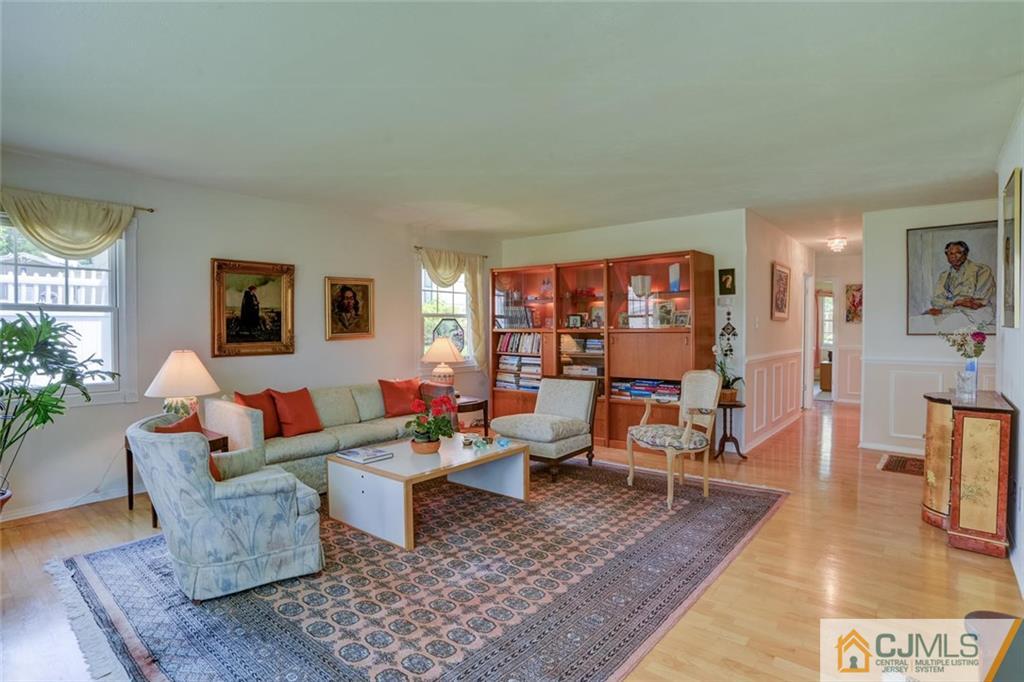 25 Indiana Road Somerset, NJ 08873 - Photo 9 of 25 a living room with furniture and wooden floor
