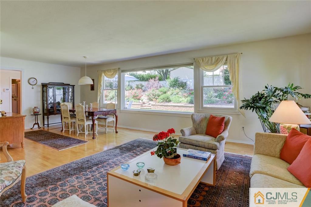 25 Indiana Road Somerset, NJ 08873 - Photo 10 of 25 a living room with furniture and a large window