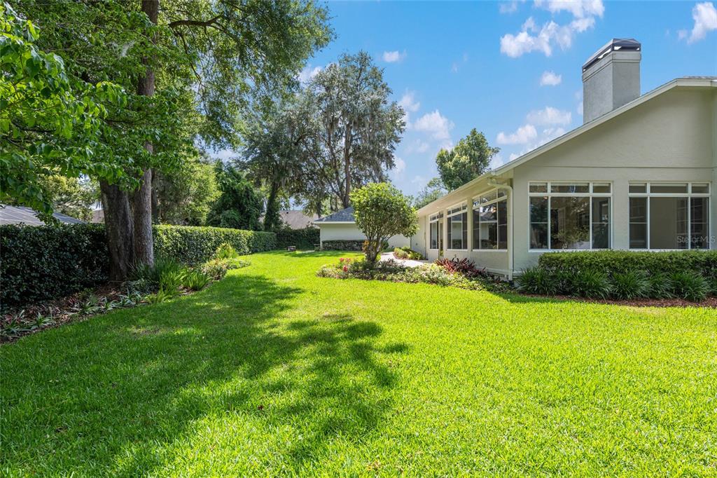 2215 Spring Hill Court Ocala, FL 34471 - Photo 51 of 62 a swimming pool with outdoor seating and yard