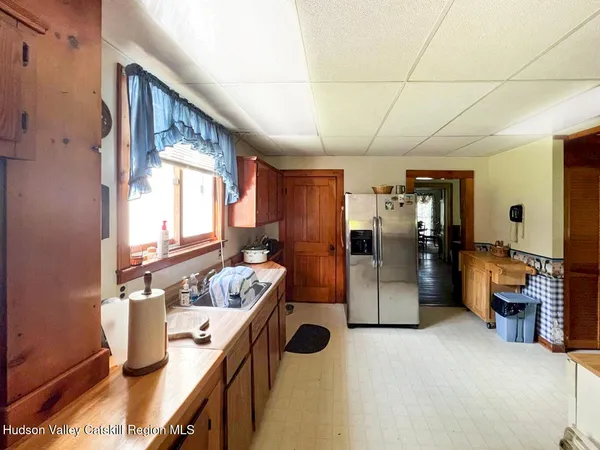 a bathroom with a sink double vanity and a tub