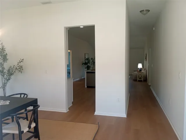 a view of a hallway and interior of the house