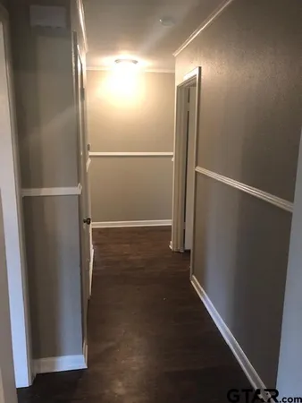 a view of a room that has a window in it