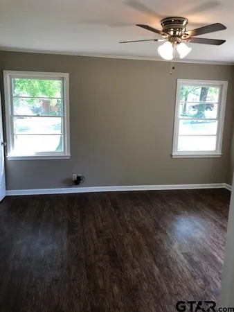 a bathroom with a sink toilet and vanity
