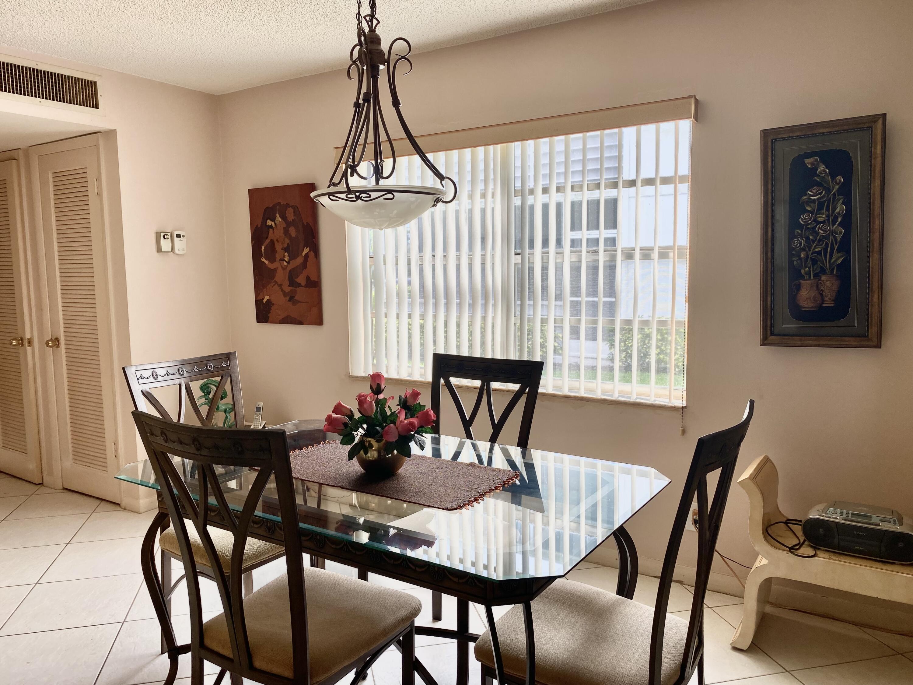 119 Flanders C Delray Beach, FL 33484 - Photo 9 of 32 dining area