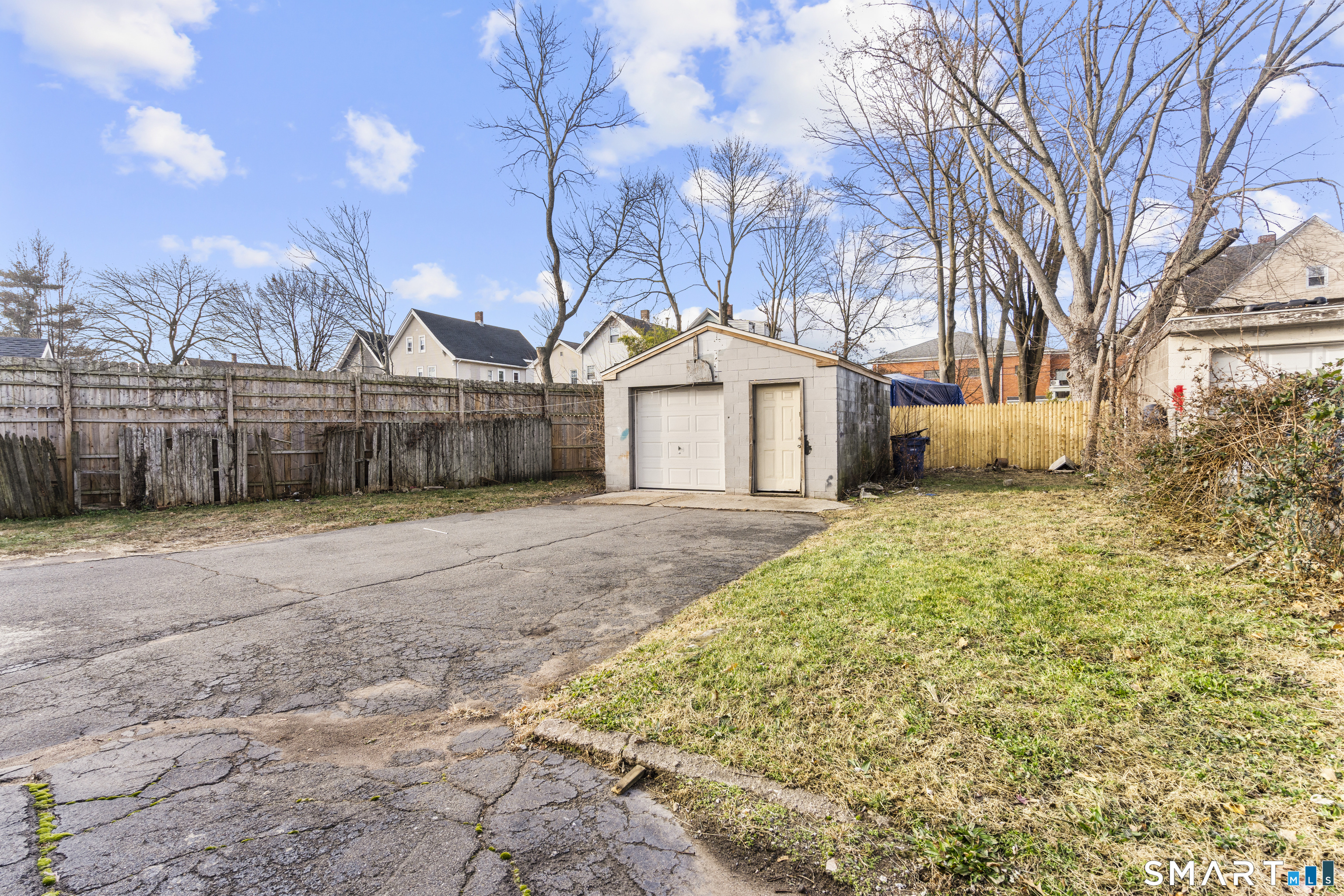 426 Poplar Street New Haven, CT 06513 - Photo 23 of 25 a front view of a house with a yard and garage