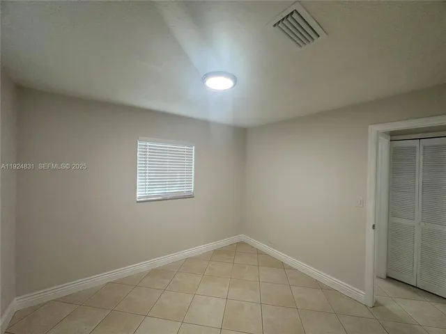 a bathroom with a sink a toilet and bathtub