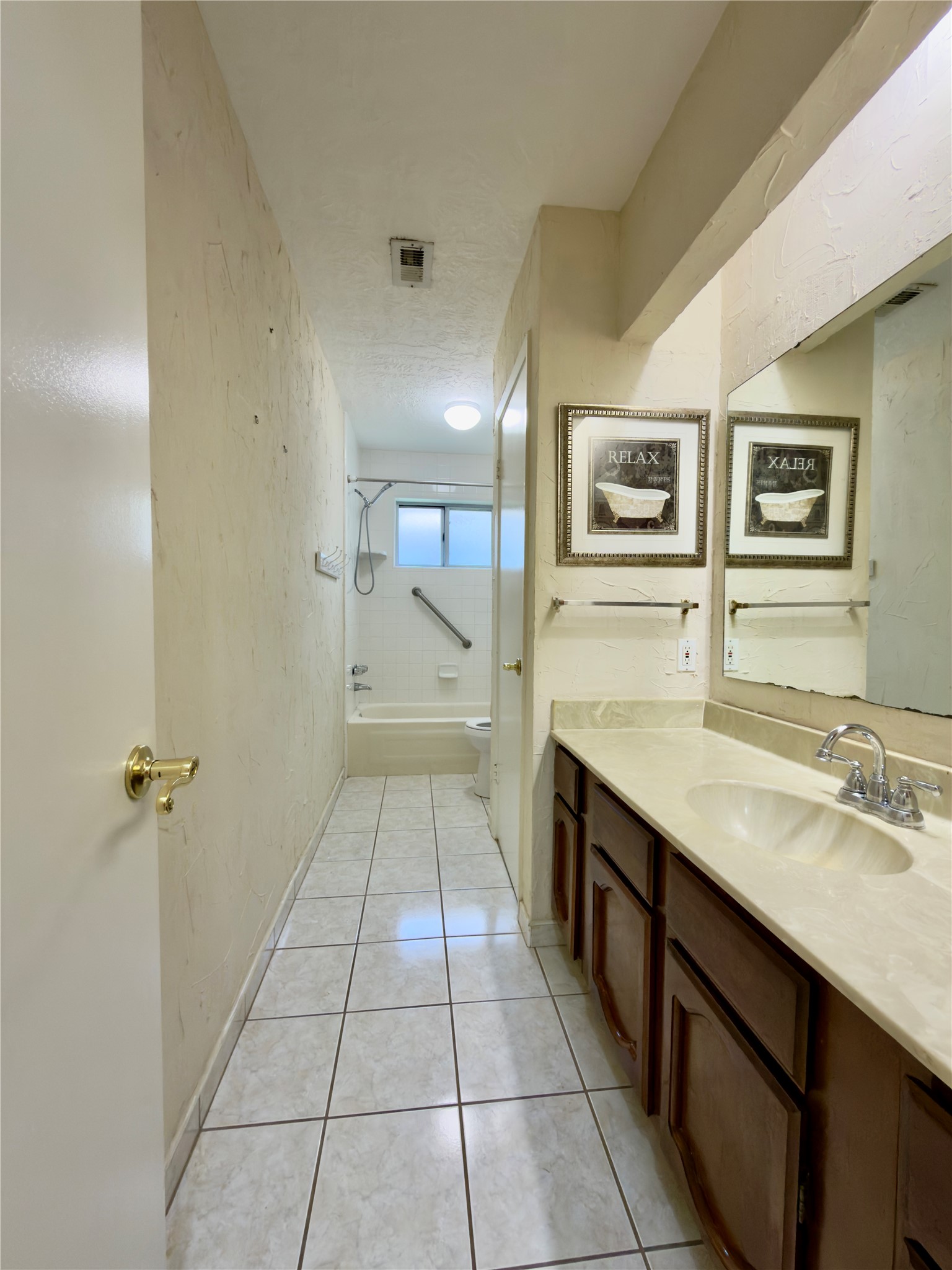 23115 Bright Star Road Spring, TX 77373 - Photo 12 of 14 a bathroom with a sink and a mirror