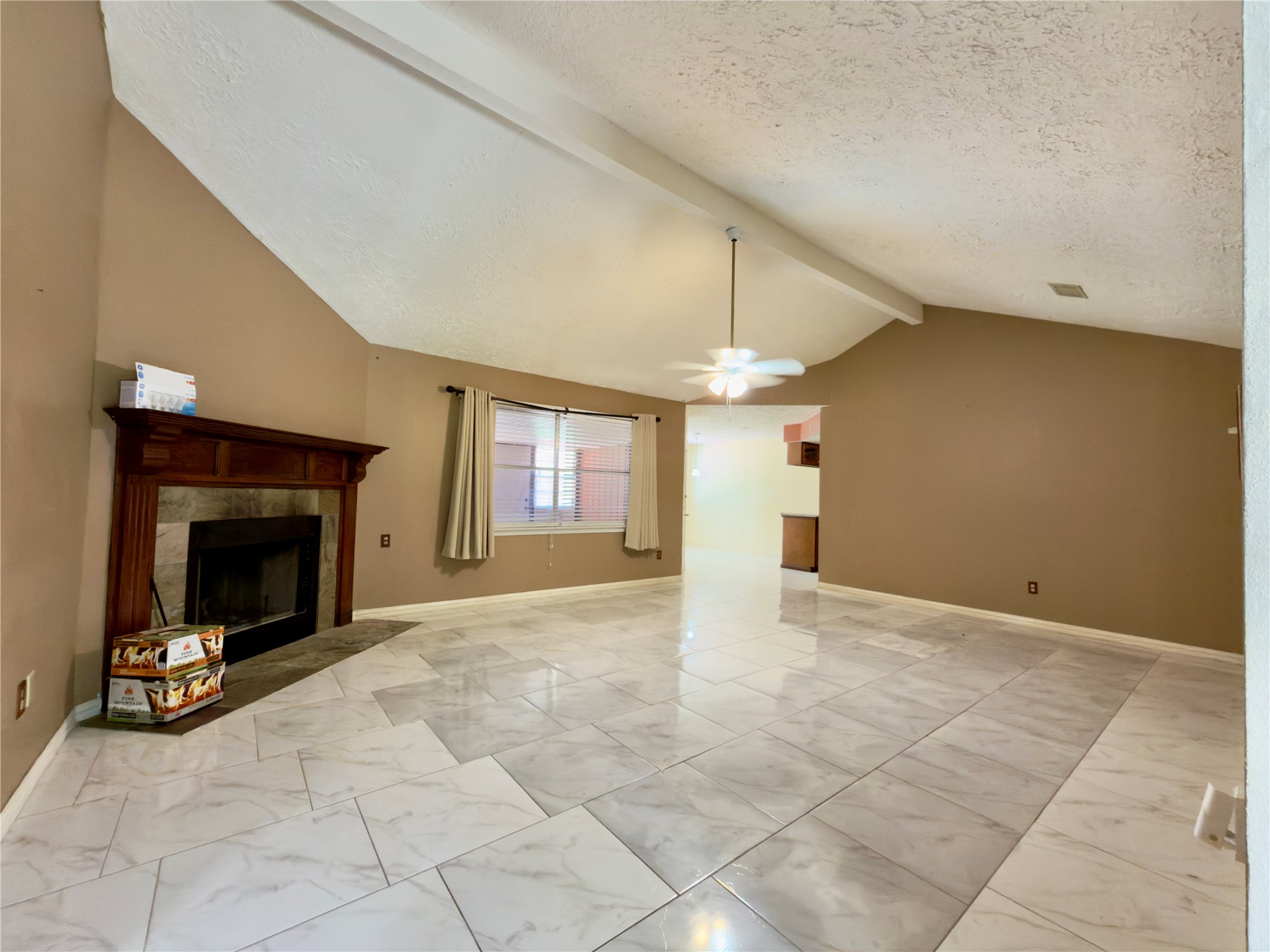 23115 Bright Star Road Spring, TX 77373 - Photo 2 of 14 a view of an empty room with a fireplace