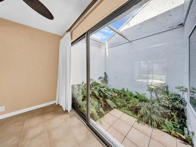 a potted plant sitting in front of a window