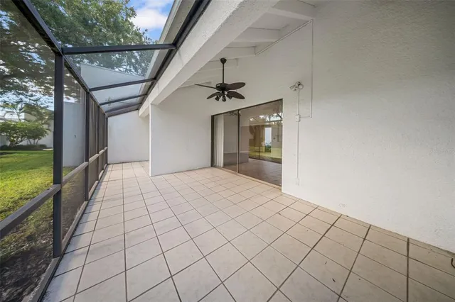 a view of a hallway with a outdoor space