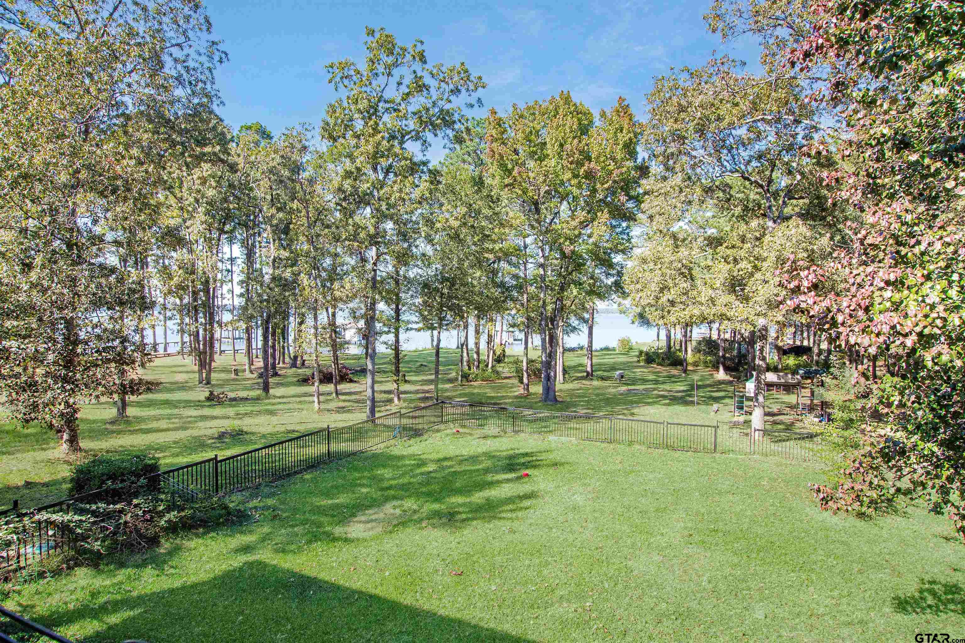 15722 Timberhill Drive Flint, TX 75762 - Photo 3 of 48 a big yard with lots of green space and trees