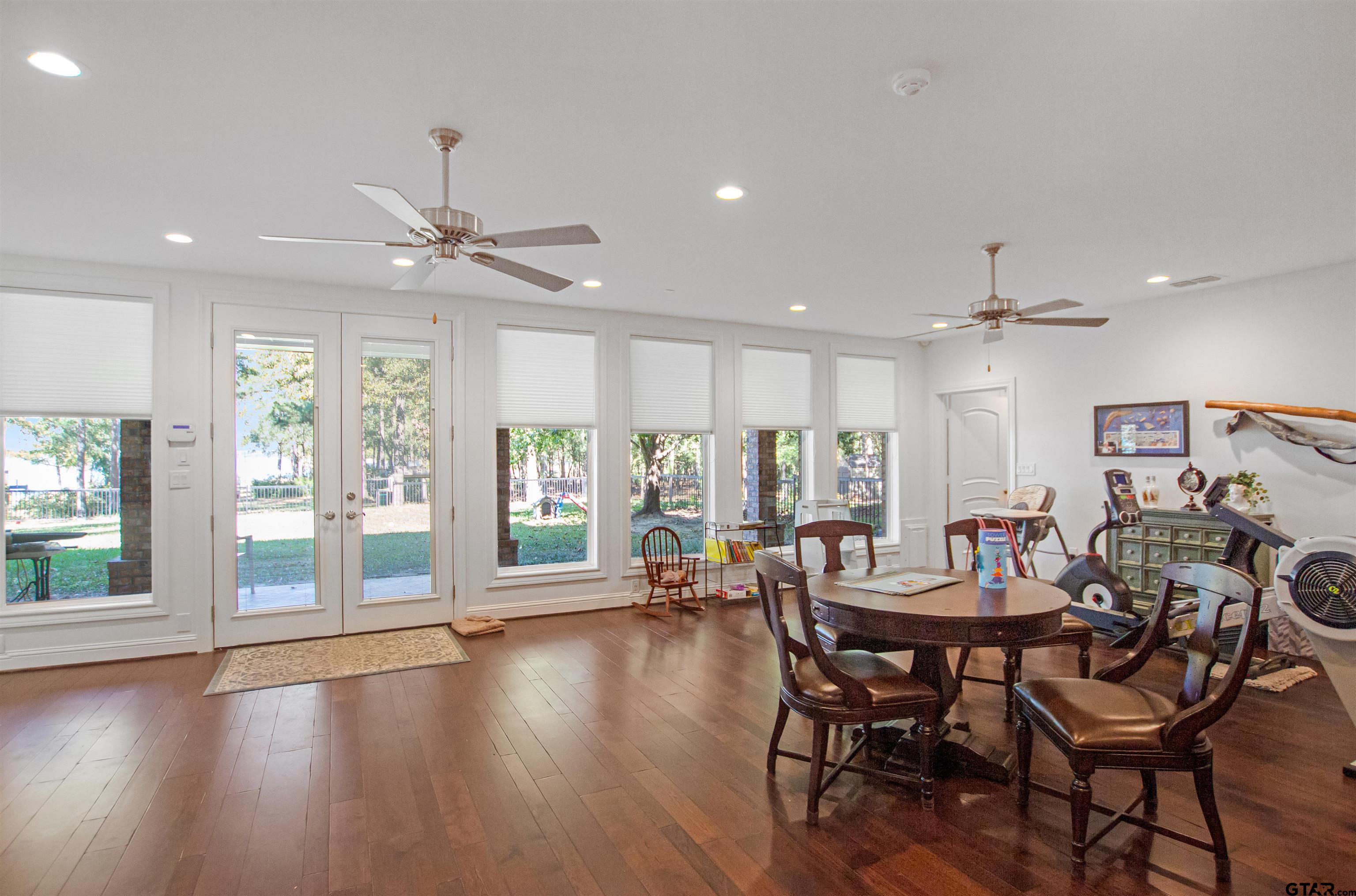 15722 Timberhill Drive Flint, TX 75762 - Photo 33 of 48 a view of a dining room with furniture window and wooden floor
