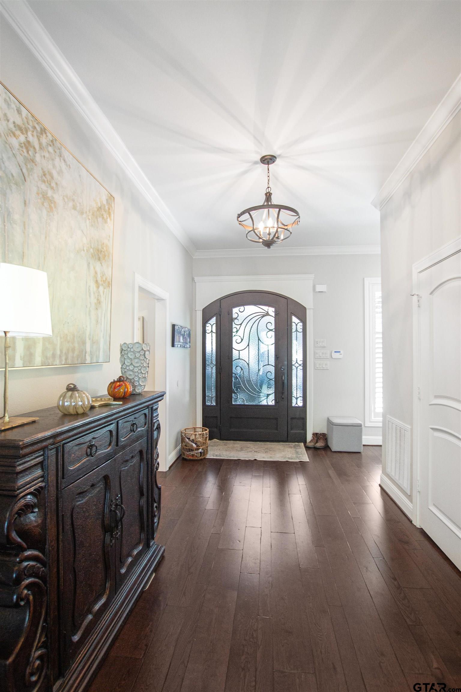15722 Timberhill Drive Flint, TX 75762 - Photo 6 of 48 a view of an empty room with wooden floor and a window