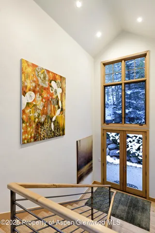 a bathroom with a granite countertop sink