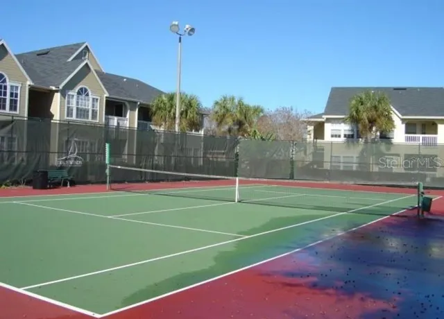 a view of a house with a swimming pool