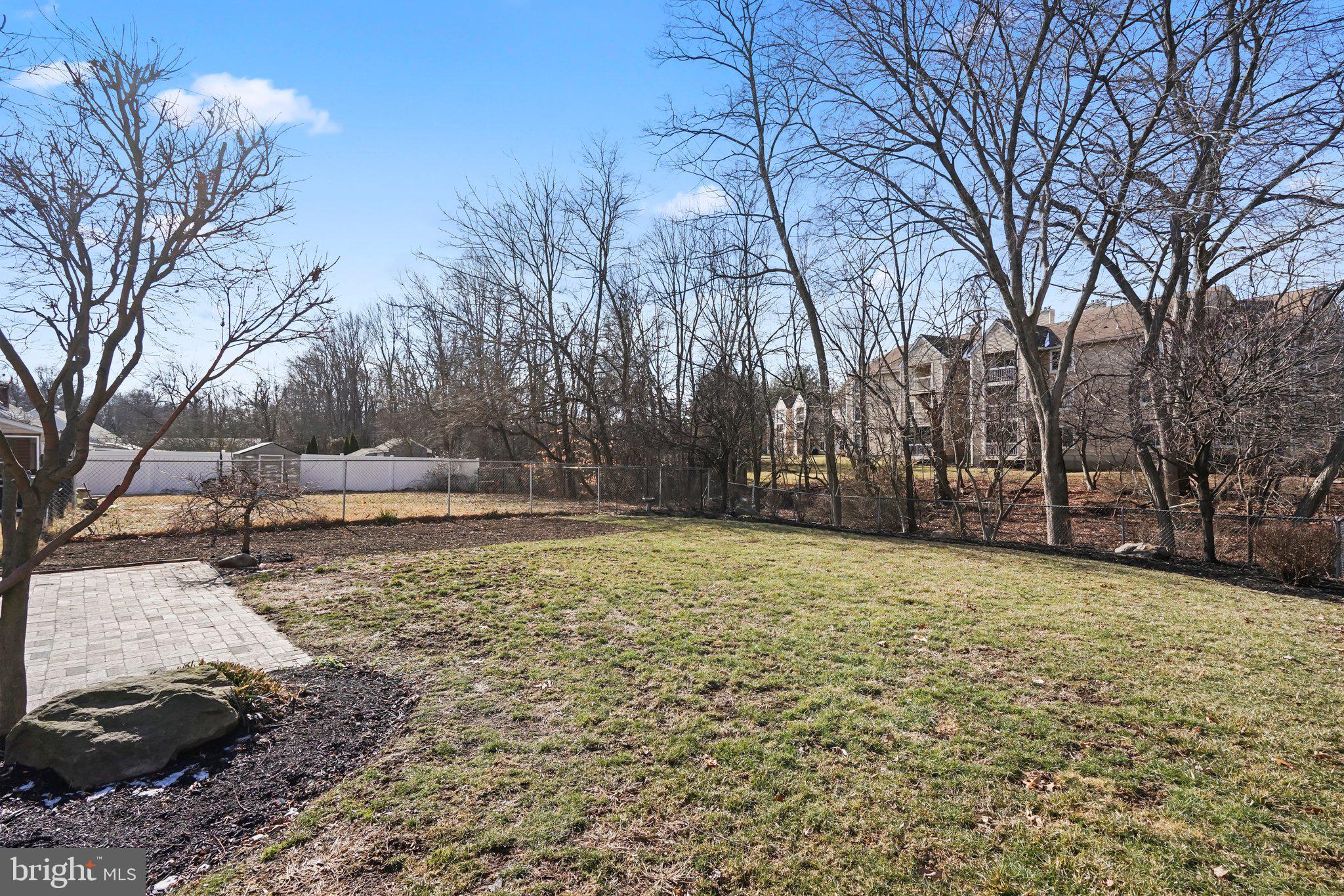 312 Wynnewood Road Ewing, NJ 08628 - Photo 17 of 24 a view of a yard with trees