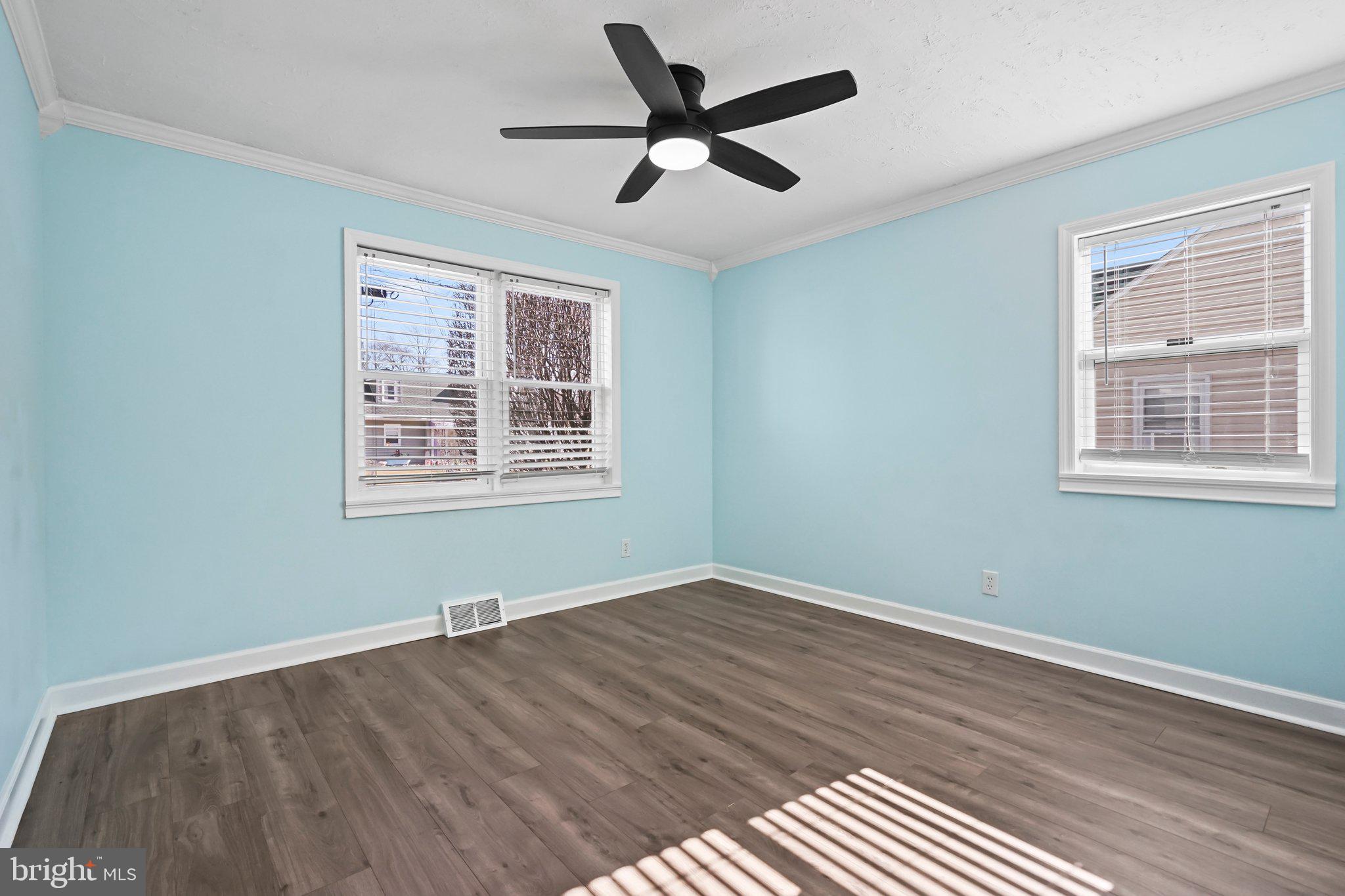 312 Wynnewood Road Ewing, NJ 08628 - Photo 10 of 24 a view of empty room with wooden floor and fan