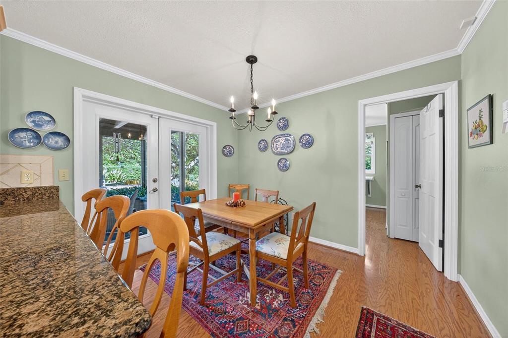 1053 Sweetbriar Road Orlando, FL 32806 - Photo 39 of 79 a view of a dining room with furniture window and outside view