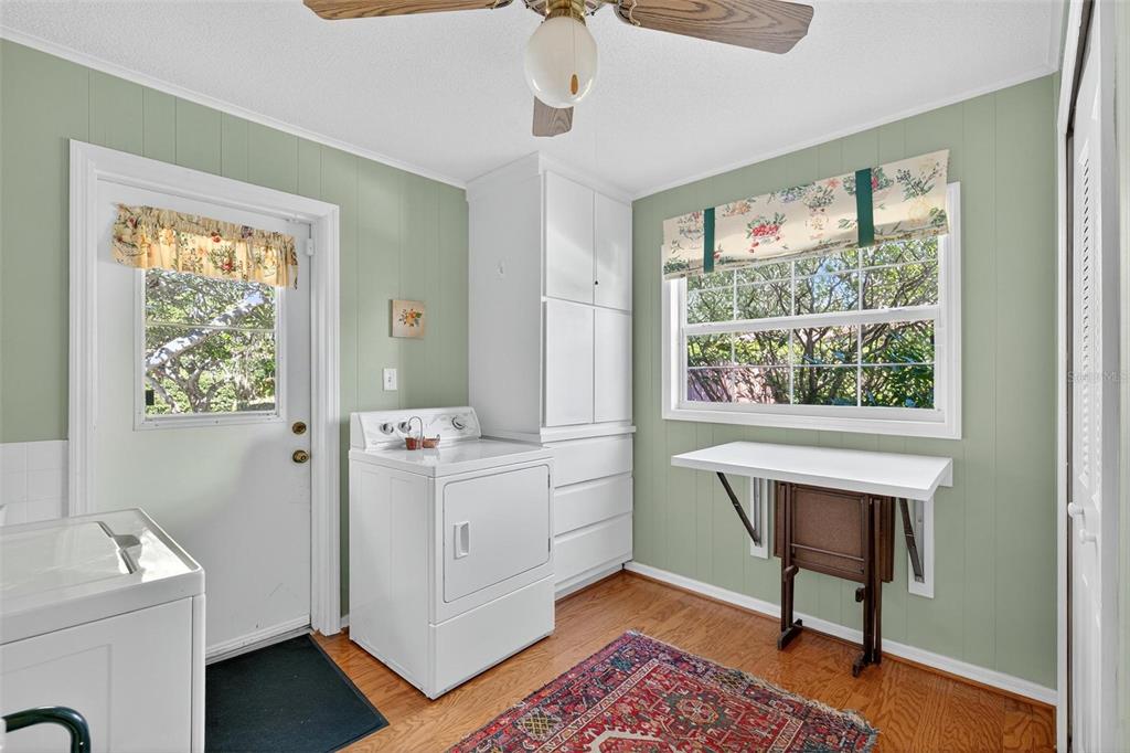 1053 Sweetbriar Road Orlando, FL 32806 - Photo 41 of 79 a view of a workspace with furniture and a window