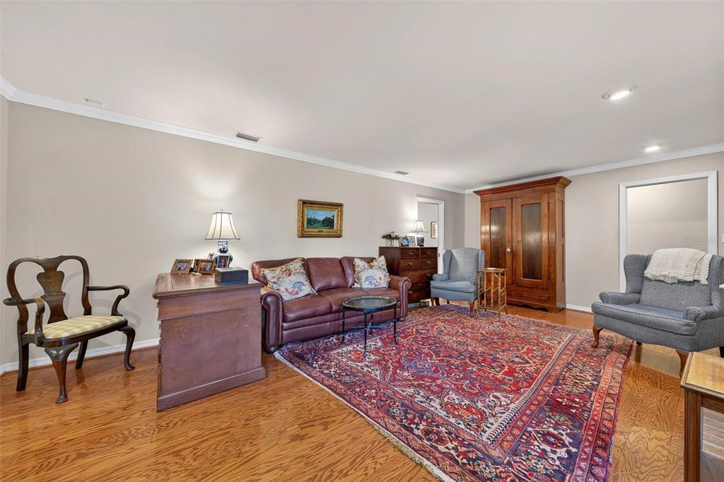 1053 Sweetbriar Road Orlando, FL 32806 - Photo 47 of 79 a living room with furniture rug and a window