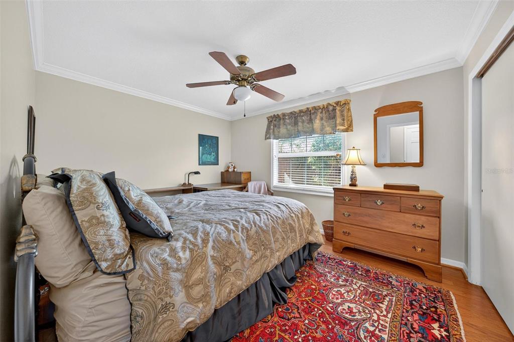 1053 Sweetbriar Road Orlando, FL 32806 - Photo 57 of 79 a bedroom with a bed and a window