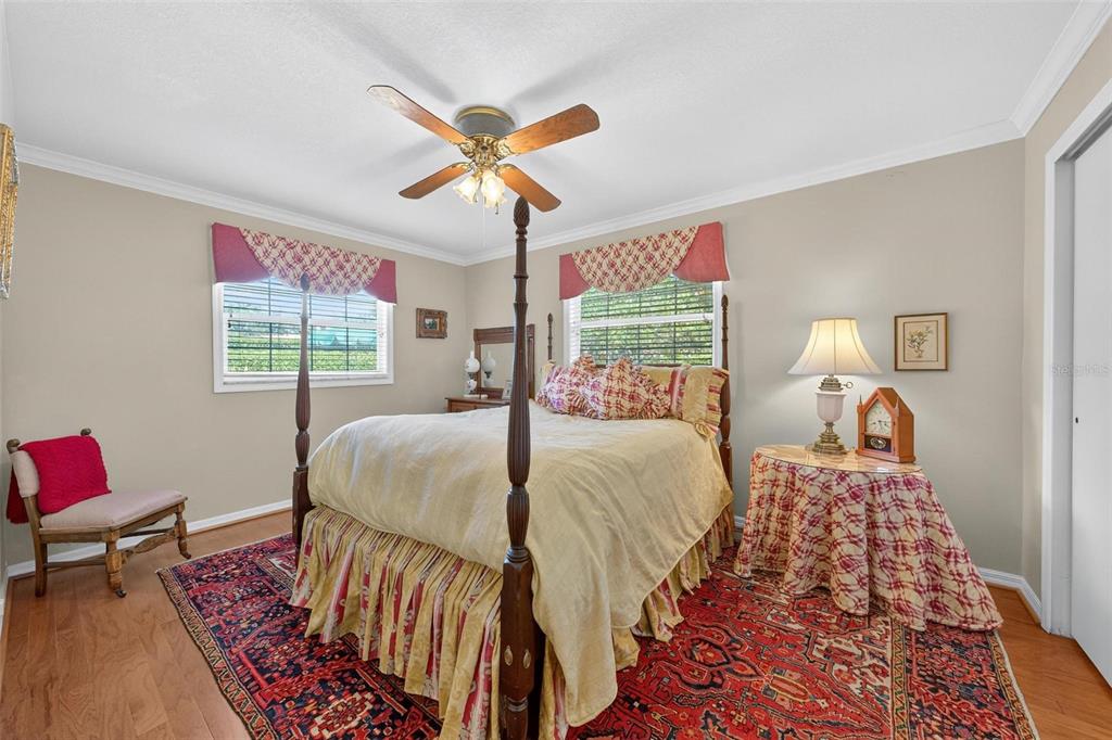 1053 Sweetbriar Road Orlando, FL 32806 - Photo 62 of 79 a bed room with a bed and a chandelier