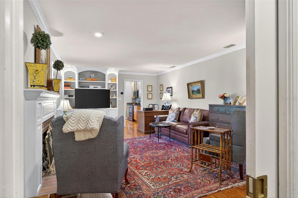 1053 Sweetbriar Road Orlando, FL 32806 - Photo 64 of 79 a living room with furniture and a couch