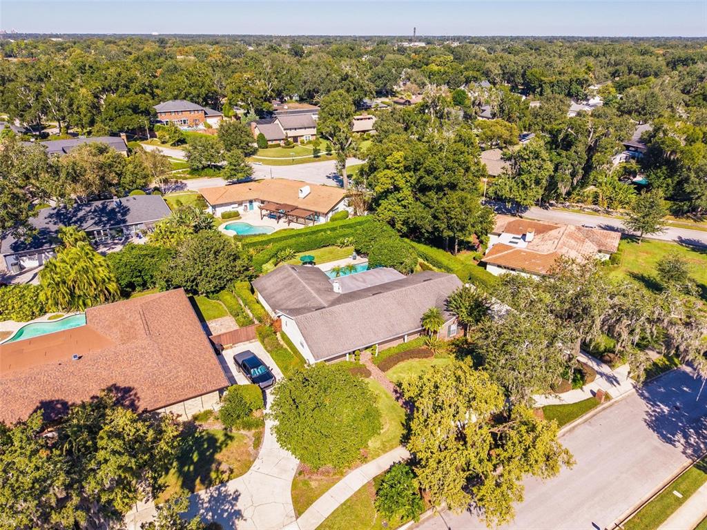 1053 Sweetbriar Road Orlando, FL 32806 - Photo 74 of 79 an aerial view of residential houses with outdoor space