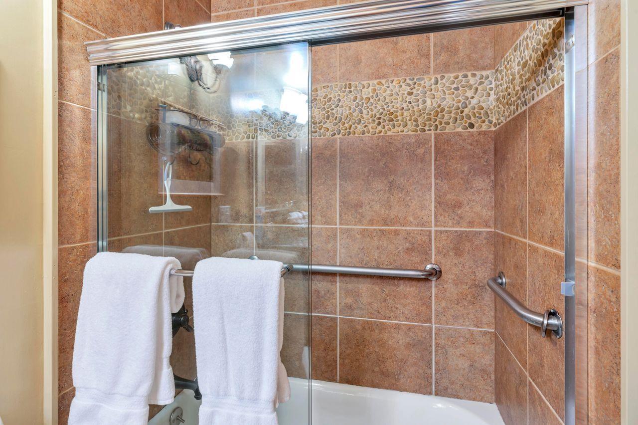 1001 Commonwealth Drive, Unit 156 Kings Beach, CA 96143 - Photo 13 of 21 a bathroom with a shower