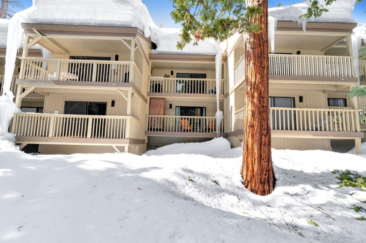 1001 Commonwealth Drive, Unit 156 Kings Beach, CA 96143 - Photo 16 of 21 a view of a house with a wooden fence
